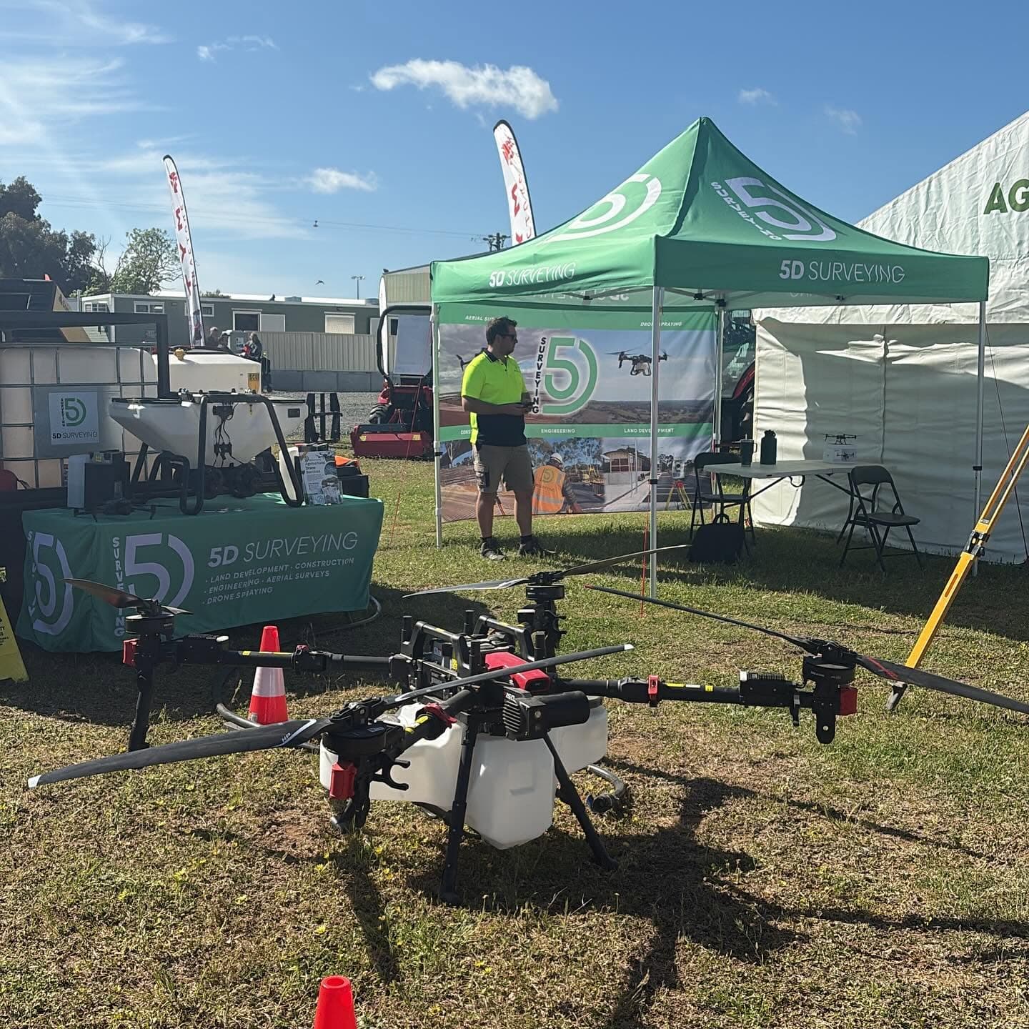 Drone spraying across a paddock